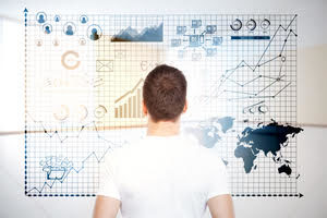 research_novuscpq_300x200 An independent CPQ analyst examines a complex data wall of charts and graphs to visualize and improve quote-to-cash solutions.